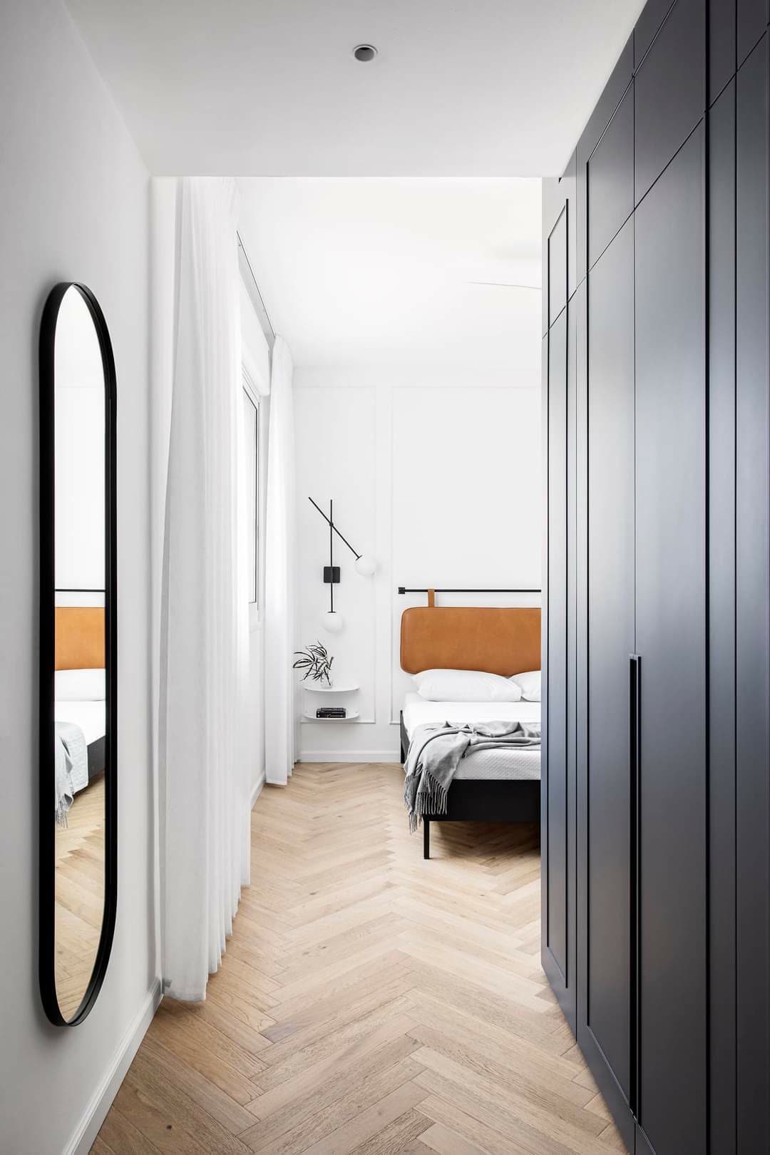 Row of navy wardrobes planned for full wardrobe inventory by iKitchen Cabinetry