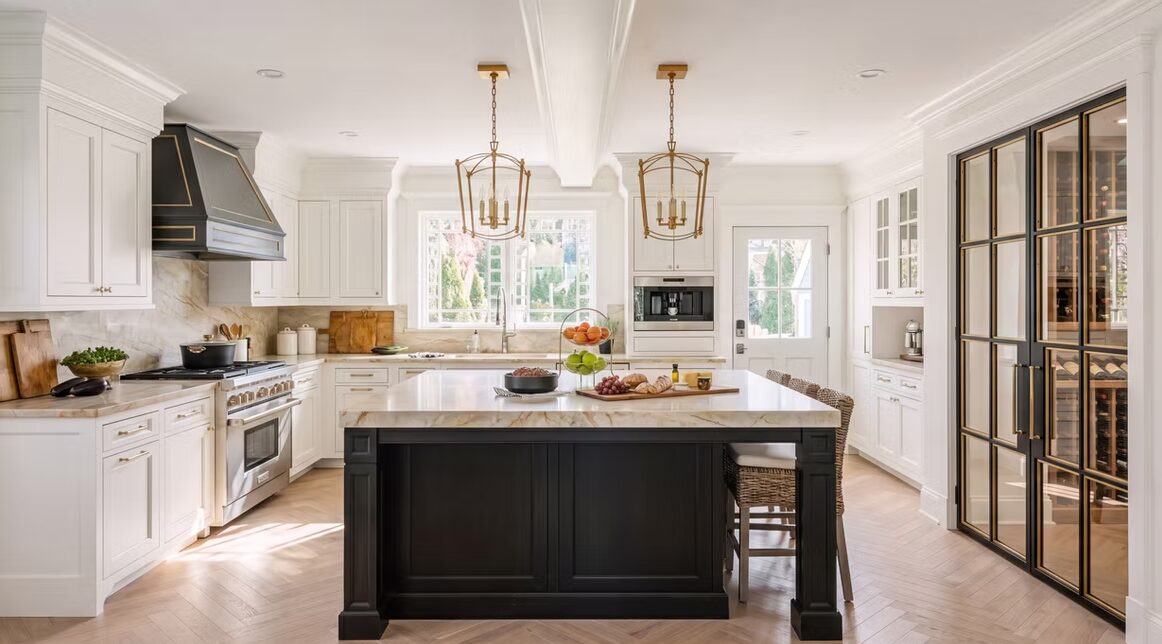 Brooklyn brownstone custom kitchen with brass pendants and dark island by iKitchen Cabinetry
