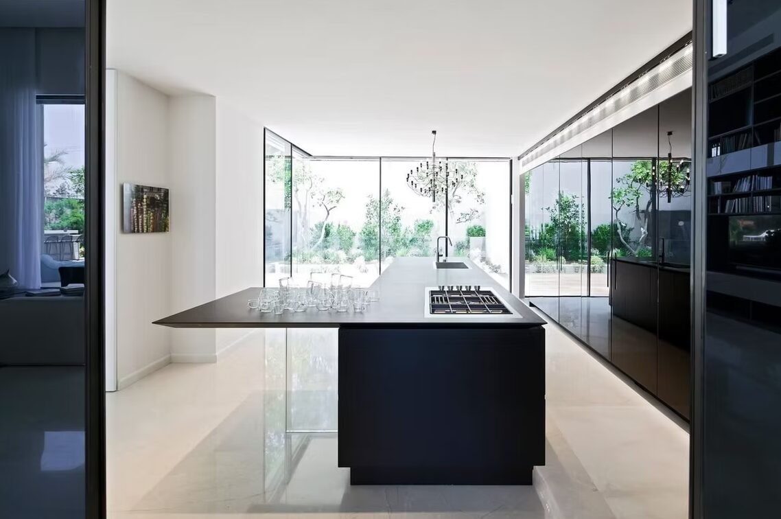 Fort Lauderdale waterfront custom kitchen with sliding glass doors by iKitchen Cabinetry