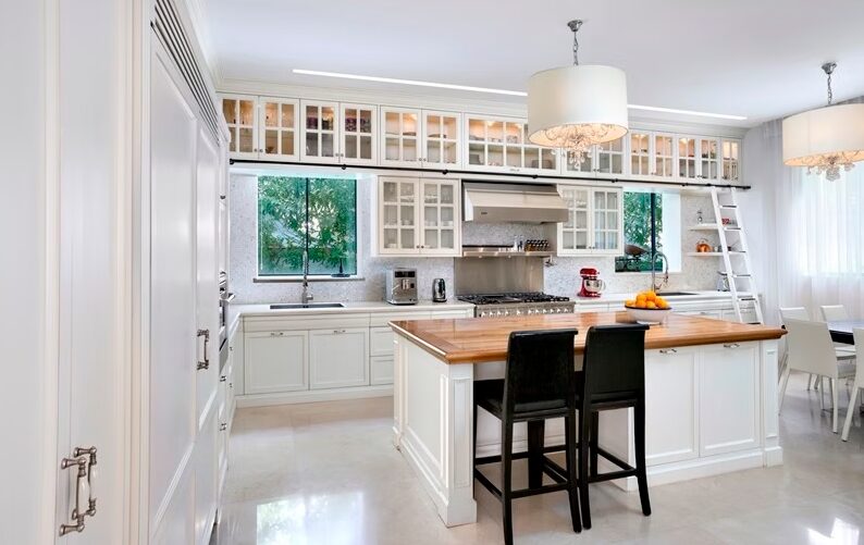 Palm Beach estate classic white custom kitchen with pendant by iKitchen Cabinetry