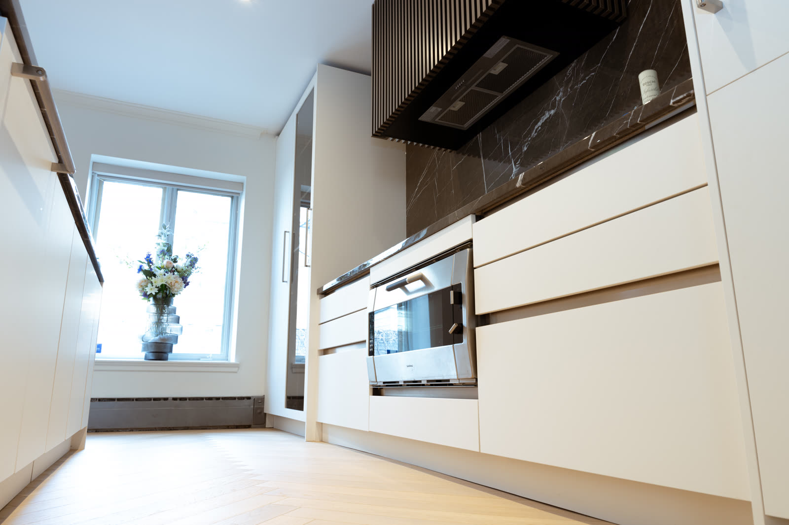 Premium European cabinet hardware detail in custom cabinetry